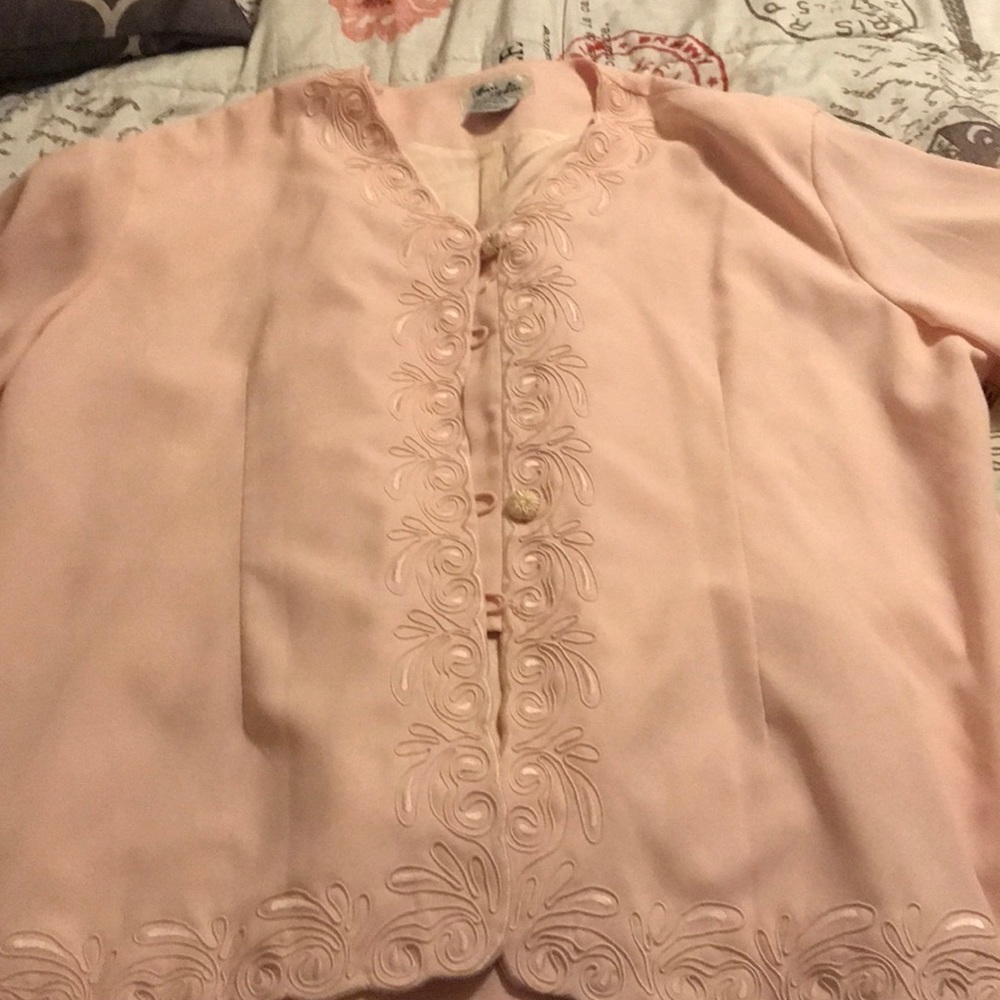 A light peach color blouse.